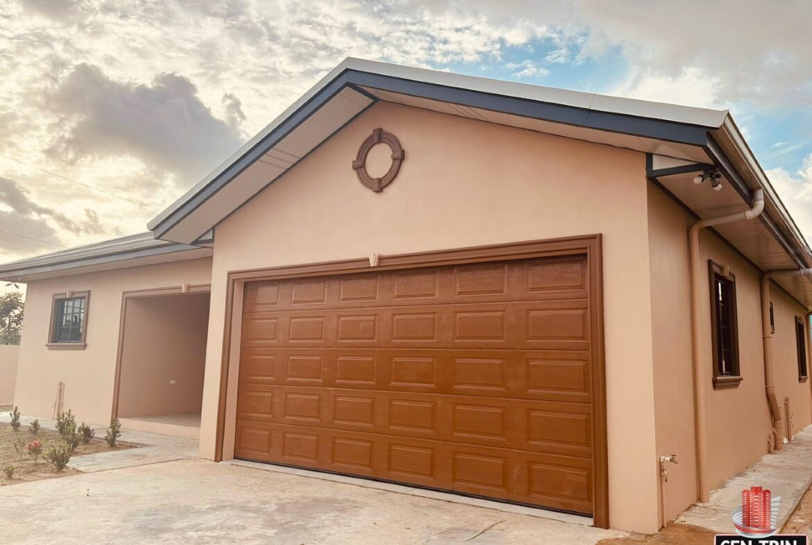 Modern house with a large brown garage door