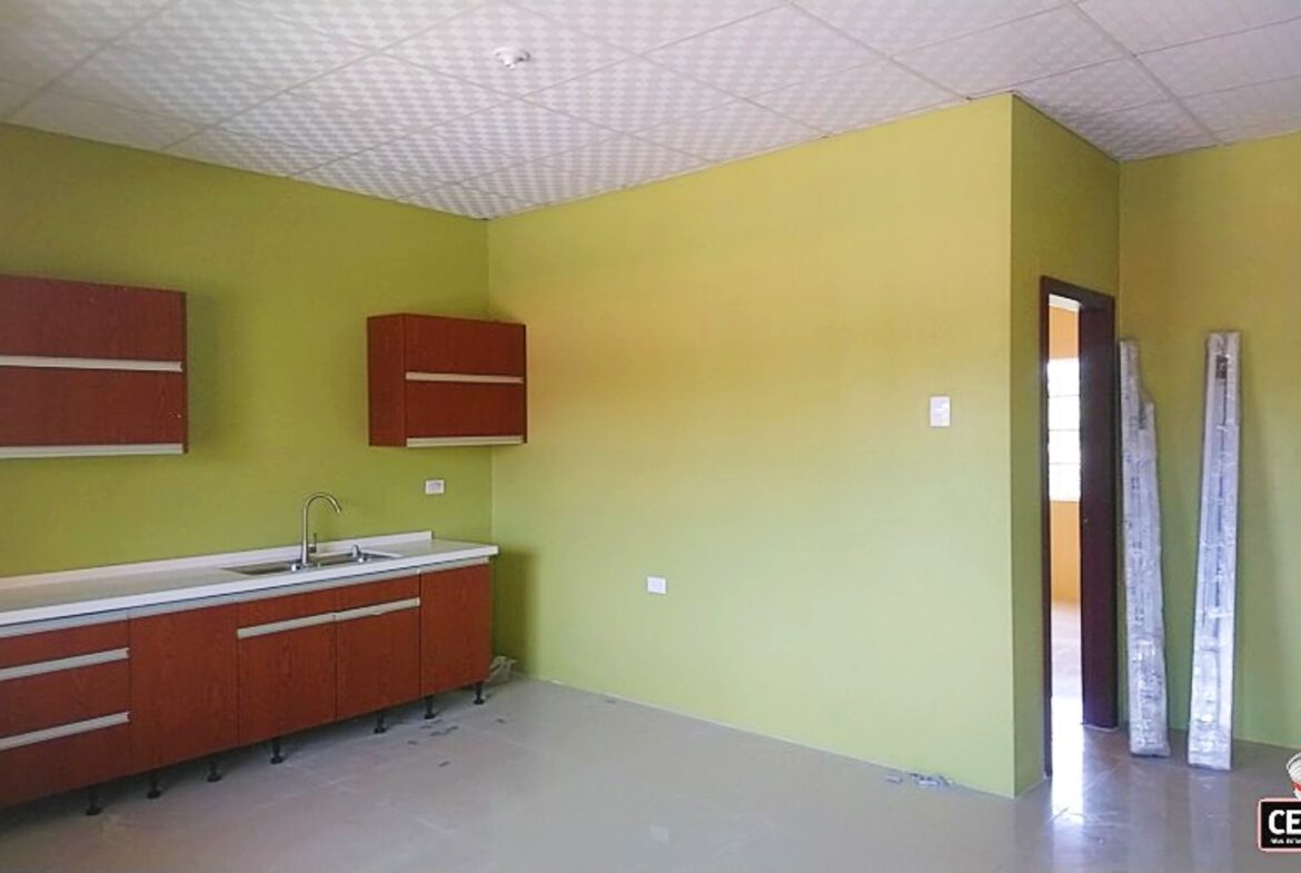 2 Bedroom Rentals Trinidad | kitchen with a sink and cabinets in a two-bedroom apartment