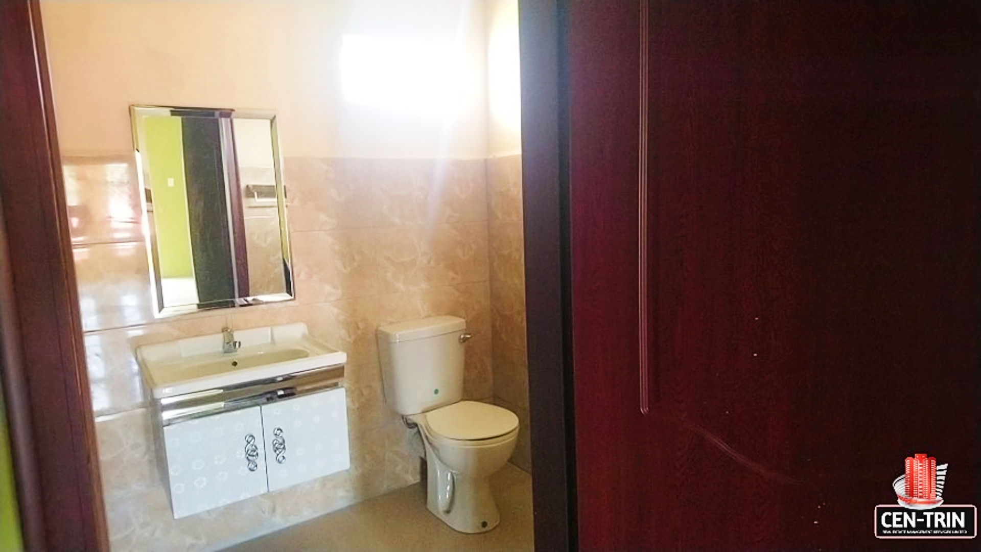 Affordable 2 Bedroom Apartments | A bathroom with a toilet and sink in a two-bedroom apartment