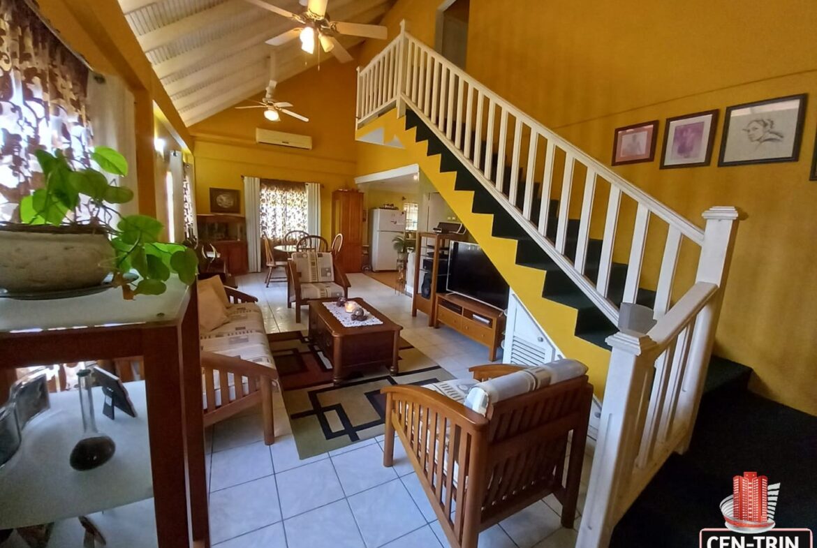 A bright and spacious living room in a 3-bedroom house for sale.