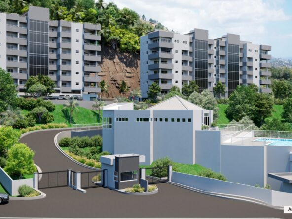 Car parked in front of modern apartment building on a hill