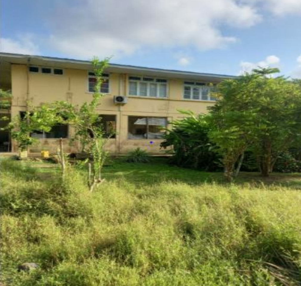 Side View Of 2 Story Home On 10 Acres Of Land For Sale